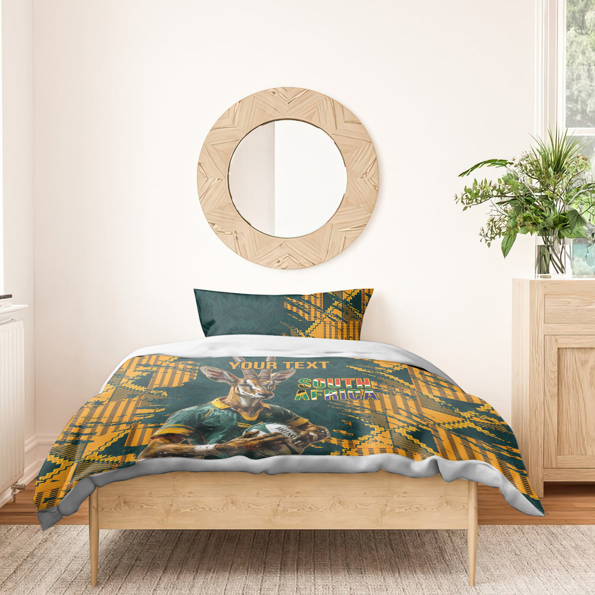 Green and yellow bedding set with gazelle mascot and South Africa text, on wooden bed with pillows
