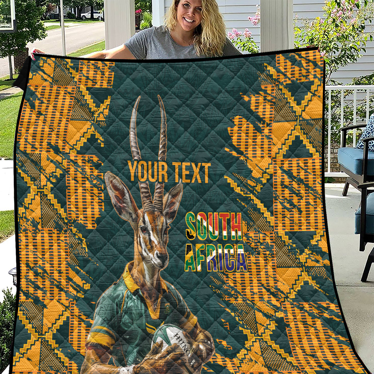 South Africa rugby quilt with green base, orange geometric pattern, antelope mascot, "YOUR TEXT"