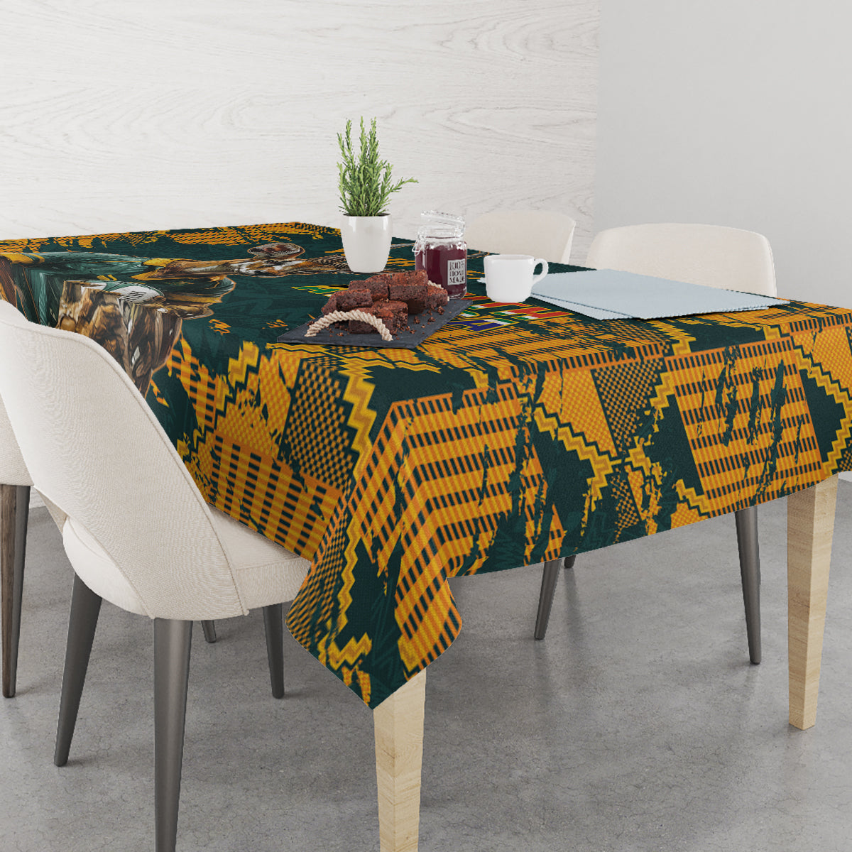 Rugby tablecloth with bold green-and-yellow geometric pattern and animal graphic