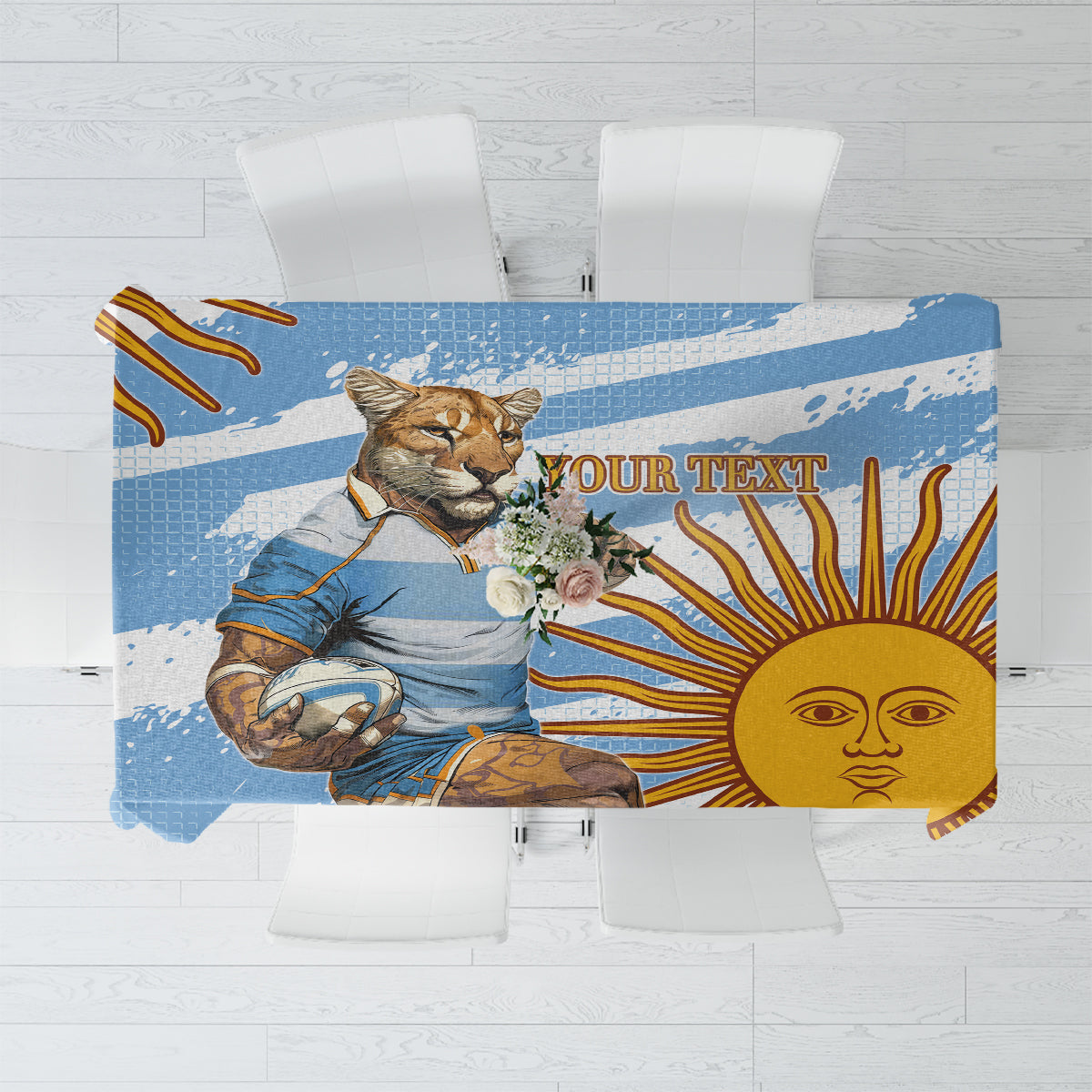 Blue tablecloth with rugby mascot print and sun face design