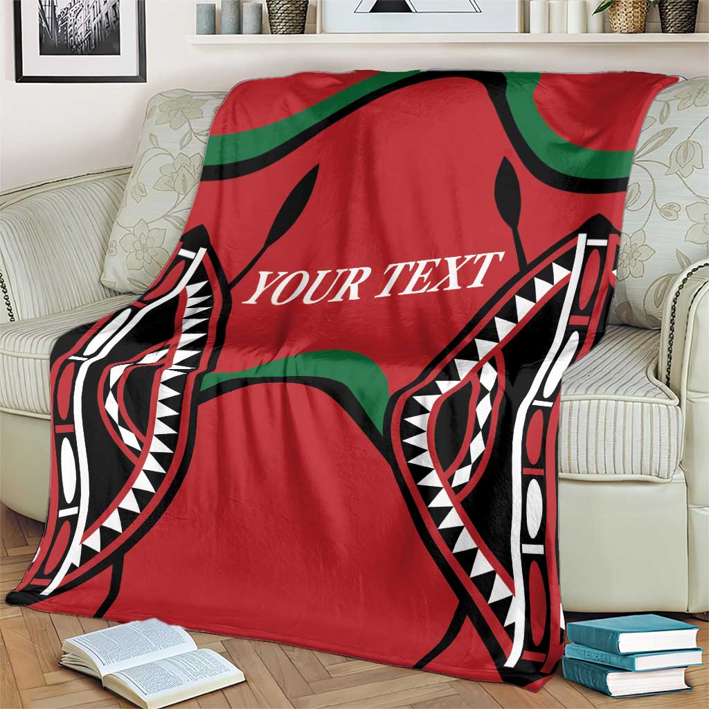 Red Kenya rugby blanket with black-and-green geometric pattern and “YOUR TEXT”.