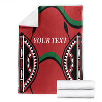 Red Kenya rugby blanket with “YOUR TEXT” and black-and-green geometric graphic.