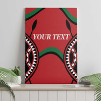 Red canvas wall art with black and green tribal pattern and 'YOUR TEXT' text, front view