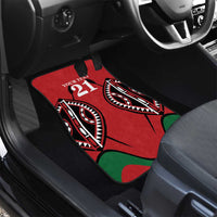 Red custom car floor mat with 21 and tribal-style graphics in the passenger area