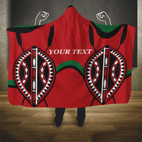 Red hooded blanket with green-and-black rugby emblem print and custom text
