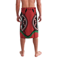 Red rugby shorts with large black tribal print and green trim, back view