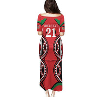 Red long off-shoulder dress with tribal pattern and “21” back graphic