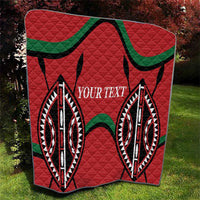 Red quilt blanket with diamond quilting, black and green curved accents, custom text