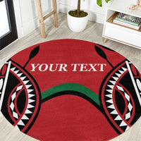 Red round rugby carpet close-up with black-and-white eye motifs and 'YOUR TEXT'