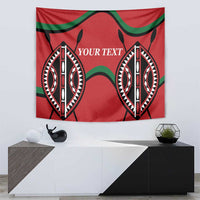 Red rugby tapestry with green trim and two black-and-white emblem masks, centered “YOUR TEXT”
