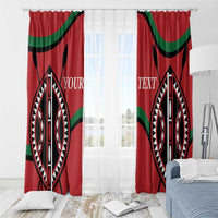 Red window curtains with bold black oval geometric pattern and green curved stripe detailing