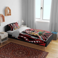 Red and black duvet bedding set with shield crest and lion artwork, paired pillowcases