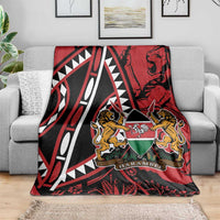 Red and black Africa-themed blanket with geometric stripes and central lions crest