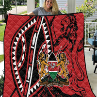 Red quilt with large black-and-white graphic and Harambe emblem in center