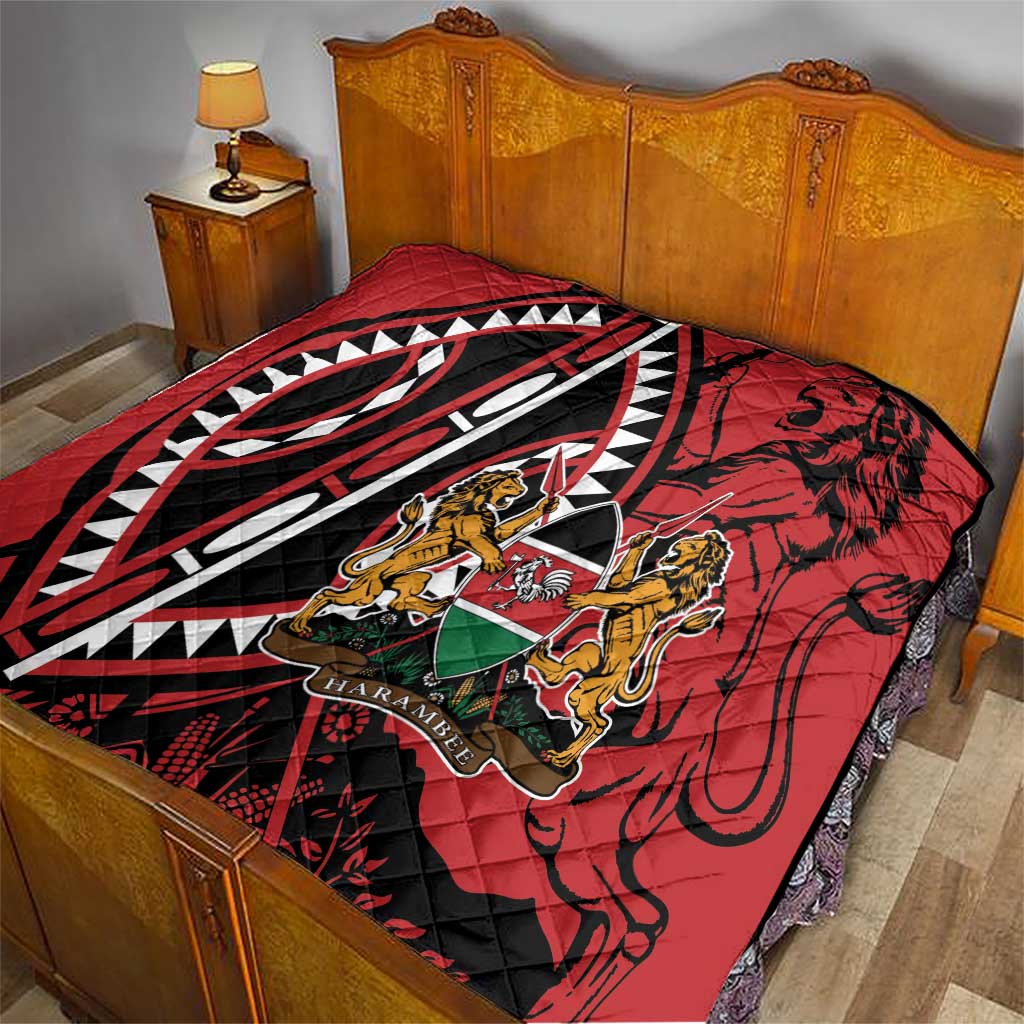 Red quilt on bed with black-and-white pattern and Harambe shield crest
