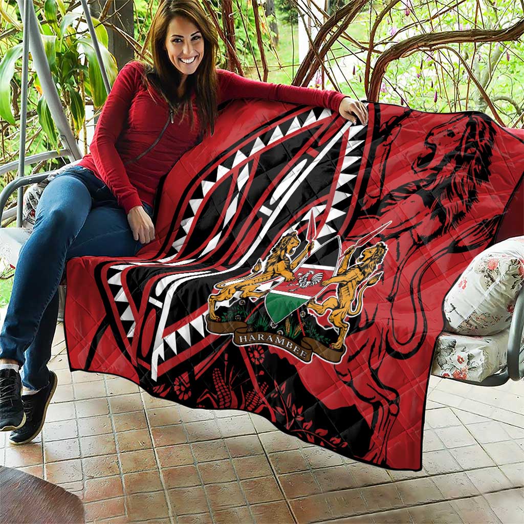 Red quilt blanket with black-and-white design and Harambe crest