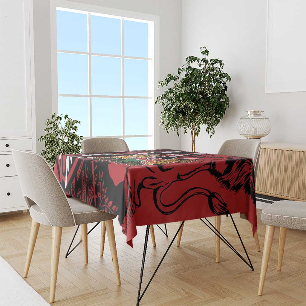 Red and black tablecloth with African shield design on dining set