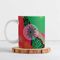 Ceramic mug with colorful tropical pattern, white handle and rim, printed side design