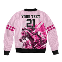 Pink bomber jacket back with black ribbed collar, checkered panels, horse graphic