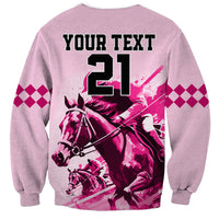 Pink crewneck sweatshirt with back 'YOUR TEXT 21' horse racing graphic and checkered sleeves