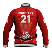Red rugby baseball jacket with striped cuffs and back print, large number 21 crest