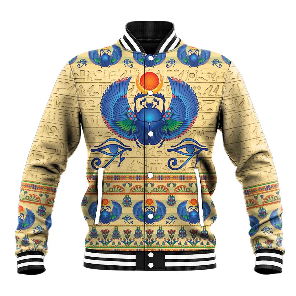 Beige baseball jacket with colorful ancient Egyptian emblem, black-and-white striped cuffs