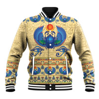 Beige baseball jacket with colorful ancient Egyptian emblem, black-and-white striped cuffs
