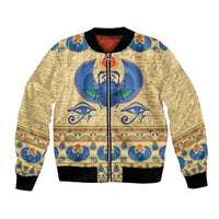 Beige bomber jacket with Egyptian scarab beetle print, front zipper and ribbed cuffs