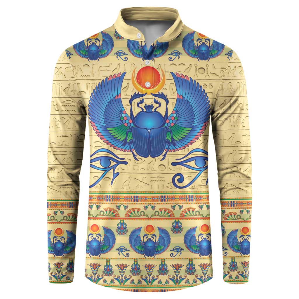 Beige henley sweatshirt with blue Egyptian-style scarab graphic and long sleeves