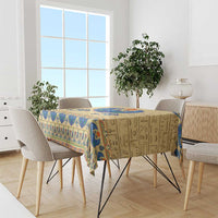 Beige rectangular tablecloth with blue scarab design, hieroglyphs, and ornate border