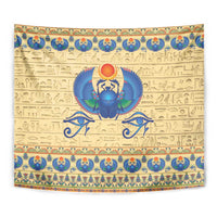 Beige scarab beetle tapestry with blue wings, orange sun circle, and patterned frame