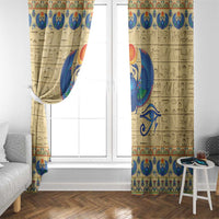 Beige curtain panels with blue winged scarab design at center, Egyptian border
