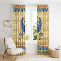 Beige curtain panel with blue winged scarab, framed by Egyptian text and ornate trim