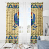 Beige window curtain panels with blue winged scarab and gold Egyptian decorative motifs