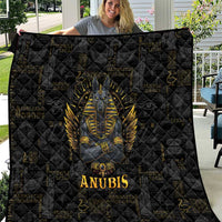 Black quilt with quilted diamond pattern, golden Anubis with wings, and 'ANUBIS' text.