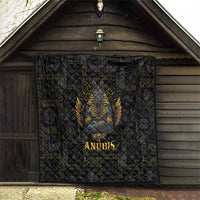 Black quilt with quilted diamond pattern and golden Anubis face, 'ANUBIS' text near center.
