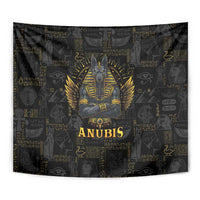 Black Anubis Egyptian tapestry showing gold Anubis head, wings, and ANUBIS text