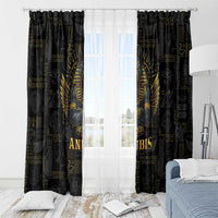 Black window curtain panels with gold Anubis portrait and decorative rod rings on top
