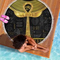 Round black beach blanket with gold ankh hieroglyph design and white fringe border