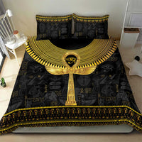 Black bedding set with gold ankh medallion on duvet and striped-gold bottom border
