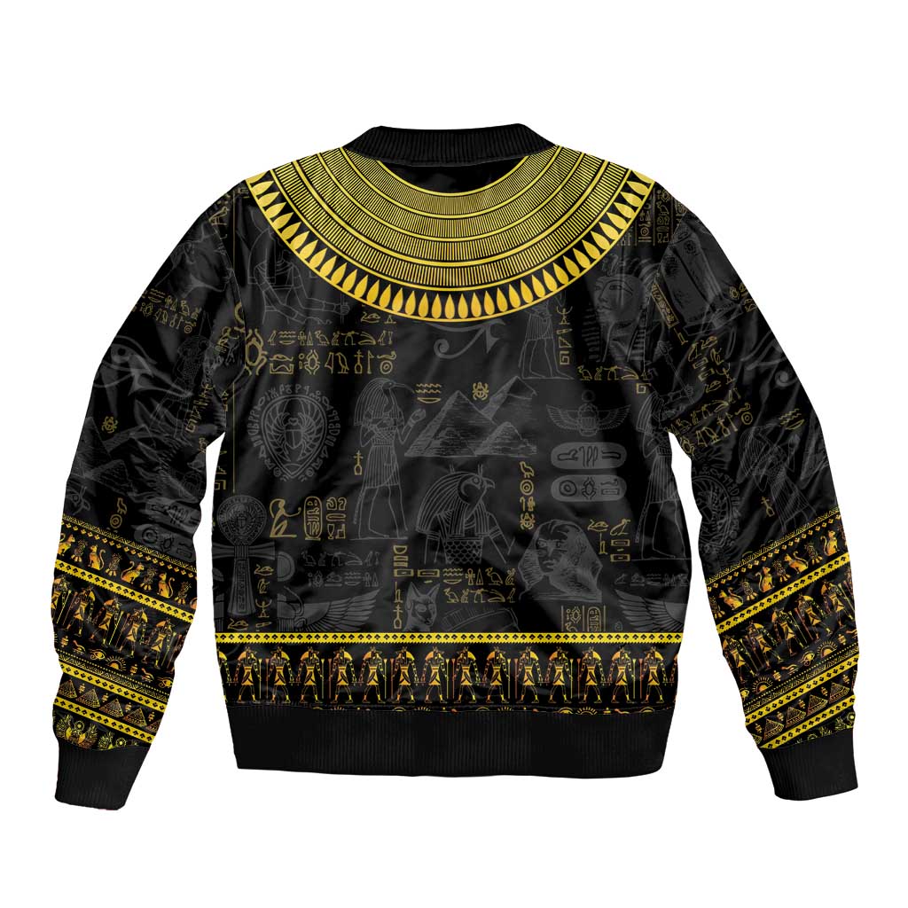 Black bomber jacket with gold hieroglyph print and wide ribbed collar, rib hem