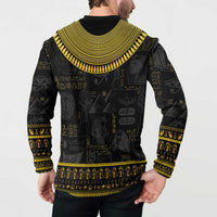 Black sweatshirt with gold Egyptian icon print and striped border, long sleeves