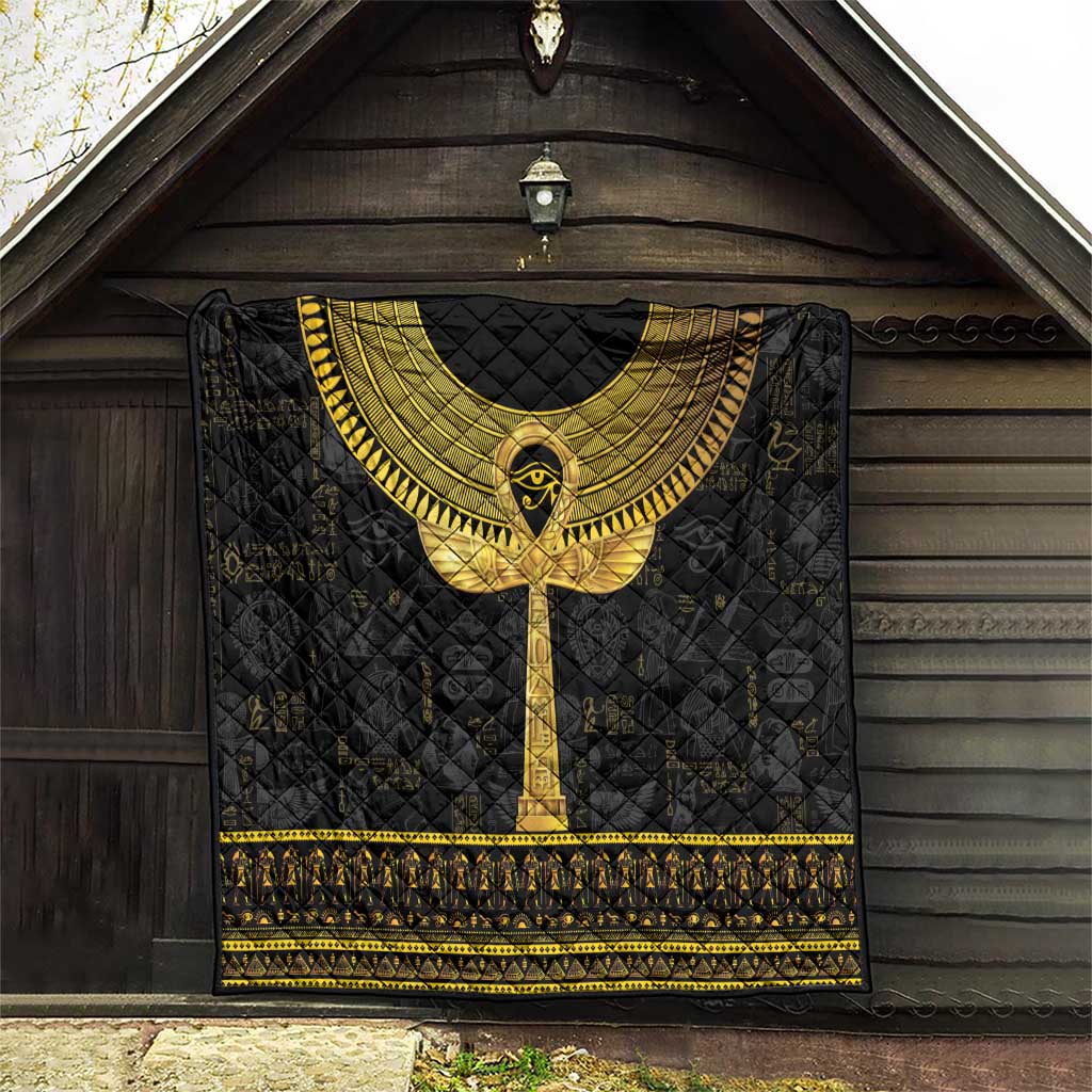 Black Egyptian hieroglyphs quilt with gold ankh emblem and patterned gold banding