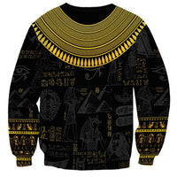 Black unisex sweatshirt with gold Egyptian hieroglyph pattern and wide winged collar