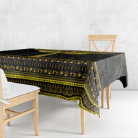Black Egyptian hieroglyph tablecloth with gold ornate border and patterned hanging corners