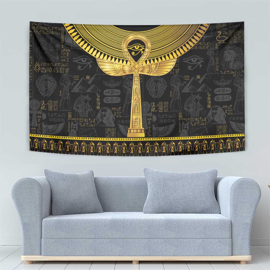 Black Egyptian tapestry with large golden ankh staff, winged headdress, and gold stripe border
