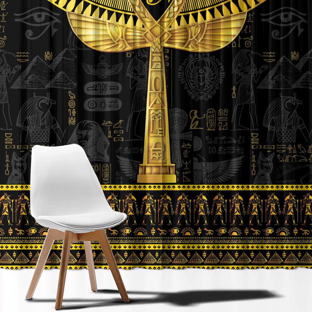 Black window curtain with large gold Ankh and hieroglyph silhouettes plus decorative band
