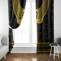 Pair of black window curtains with gold Ankh details and hieroglyph border at the hem
