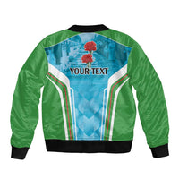 Green bomber jacket with blue back graphic, YOUR TEXT area, black ribbed collar and hem