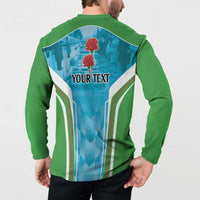 Green button-up sweatshirt back on model with blue "YOUR TEXT" graphic and stripes